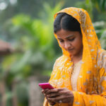 Woman enjoying an online radio program while working in a remote area